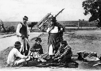 Tre män som spelar kort, Uruguay, ca 1900-talet