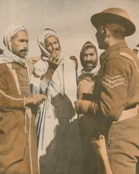 Tunisiska araber välkomnar en brittisk sergeant i Chaouach, 1943