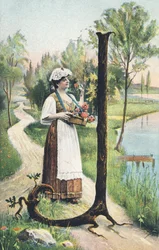 J: En stående kvinna i lång kjol, förkläde och livstycke bär en korg med blommor. Landsdekor - Alfabettecken Ref Th. E., L. Theochrom - Serie 994. Theodor Eisman, förläggare, Leipzig