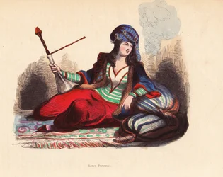 Persisk dam - Persisk adelsdam i juvelbesatt turban, pälsklädd jacka, tunika och pantalonger, röker vattenpipa, liggande på kuddar och matta - Handkolorerat träsnitt av Pannemaker och Mercier efter en illustration av H. Hendrickx ur "Mores, Us