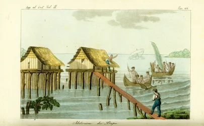 Stylta hus i havet på Rawak Island, Papua Nya Guinea
