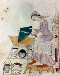 En ung kvinna som slipar en kniv. Miniatyr ur ett provensalskt manuskript av typen ”Filosofernas tänkespråk” (MS Palat. 586), 1300-talet. Biblioteca Nazionale, Florens