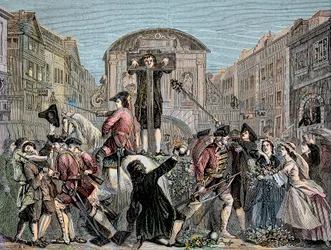 Daniel Defoe (De Foe) (1659-1731) fälldes i London 1703 för att ha publicerat sin ironiska traktat "" The Shortest Way With the Dissenters""" - Författaren och äventyraren Daniel Defoe (1659-1731) dömdes 1703 till pelaren för sina manus mot int