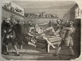Galvanisering av liket av en bödel med högen av Alessandro (Alexandre) Volta: under påverkan av elektricitet verkar liket komma tillbaka till liv. Gravyr från 1856 i "" Le Musee Des Sciences""