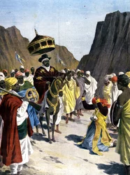 I Borumieda gör Ras Mangacha, guvernör i Tigrai-provinsen (Tigray) i Abessinien en underkastelse till Negus Menelik II (1844 - 1913) med stenen runt halsen. 1899. Ill. siluetten för pressen.