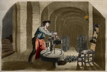Tillverkning av mousserande champagnevin: tappningsmaskin som används i en källare. Gravyr från 1858 i "" Le Musee Des Sciences""