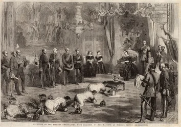 Siams ambassadörer kröp till drottning Victoria Iere (1819-1901) och prins Albert (1819-1861) under deras besök i Windsor Castle. Gravyr i "" The illustrated London News "" av den 5 december 1857.