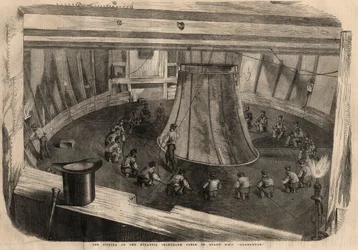 Telegrafi: lindningen av den transatlantiska kabeln ombord på fartyget H.M.S. "" Agamemnon""". Gravyr i "" The illustrated London News"" av 1 augusti