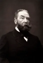 Konstnären Henri-Julien Dumont fotograferad i samband med Parissalongen 1881