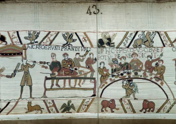 Debarques i England, Vilhelm Erövrarens (1027-1087) vapen gör en fest i väntan på att bekämpa Harold II:s saxiska vapen. Guillaume är omgiven av baroner och Eveque Odon Detail of the Bayeux Tapestry or Brodery of Queen Mathilde