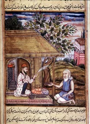 Hinduism: representation av en santon som ger allmosor. Miniatyr från ett 1400-talsmanuskript.
