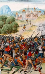 Hundraåriga kriget: Slaget vid Pontvallain mellan franska och engelska den 4/12/1370” Miniatyr från “Chronicles”” av Jean Froissart (1337-1400) 1400-talets Paris. B.N.