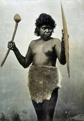 Australisk aboriginsk fru som ansvarar för sin mans armar - autokrom