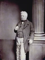 Porträtt i helfigur av den franske politikern Adolphe Thiers i eleganta 1800-talskläder