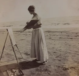 ung målare på stranden i Forte dei Marmi, Italien
