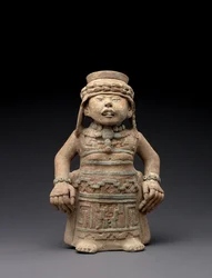 Stående kvinnlig figur, 600-900 (terrakotta med pigment)
