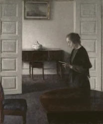 Interiör med en Lady Reading, ca 1900 (olja på duk)