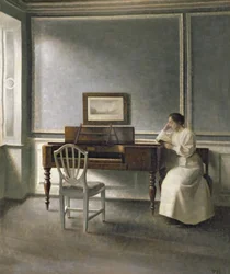 Kvinna som läser vid ett piano, 1907