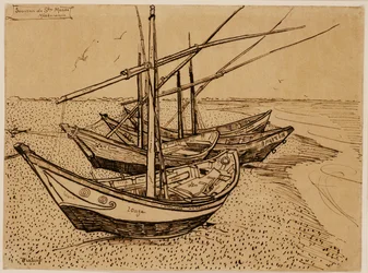 Fiskebåtar på stranden vid Saintes-Maries-de-la-Mer