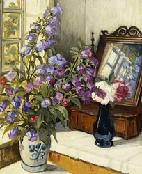 Foxgloves och rosor på ett sminkbord