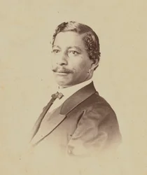 Carte-de-visit-porträtt av John W. Menard, 1868-1870.