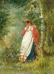 Ung kvinna i skogen