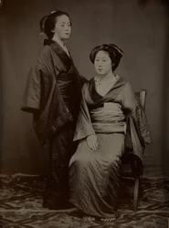 [Geisha med skötare], 1860-talet.
