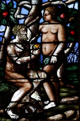 Milanos katedral. Fönster i målat glas. Adam och Eva. Edens trädgård. Italien.