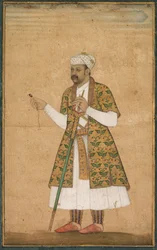 En hovman, möjligen Khan Alam, som håller en spinell och ett Deccan-svärd