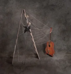Stilleben med akustisk gitarr